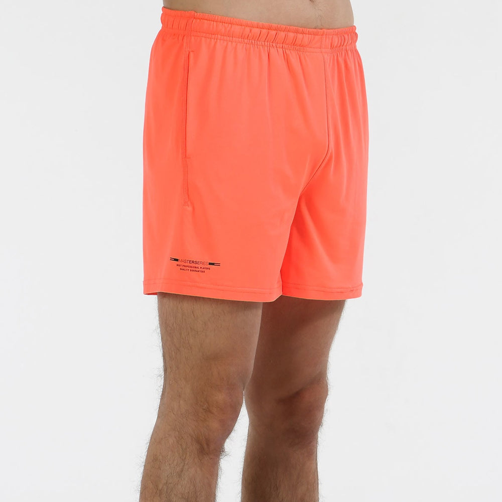 BULLPADEL SHORT MOJEL CORAL FLUOR